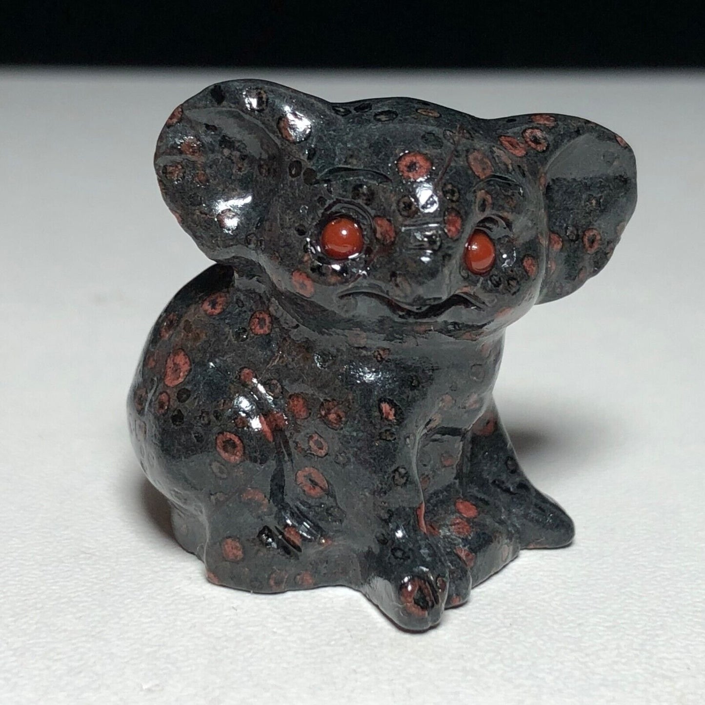 Unusual Fireworks Garnet Koala, 29mm Tall, 21g (Black, Gray, Red)